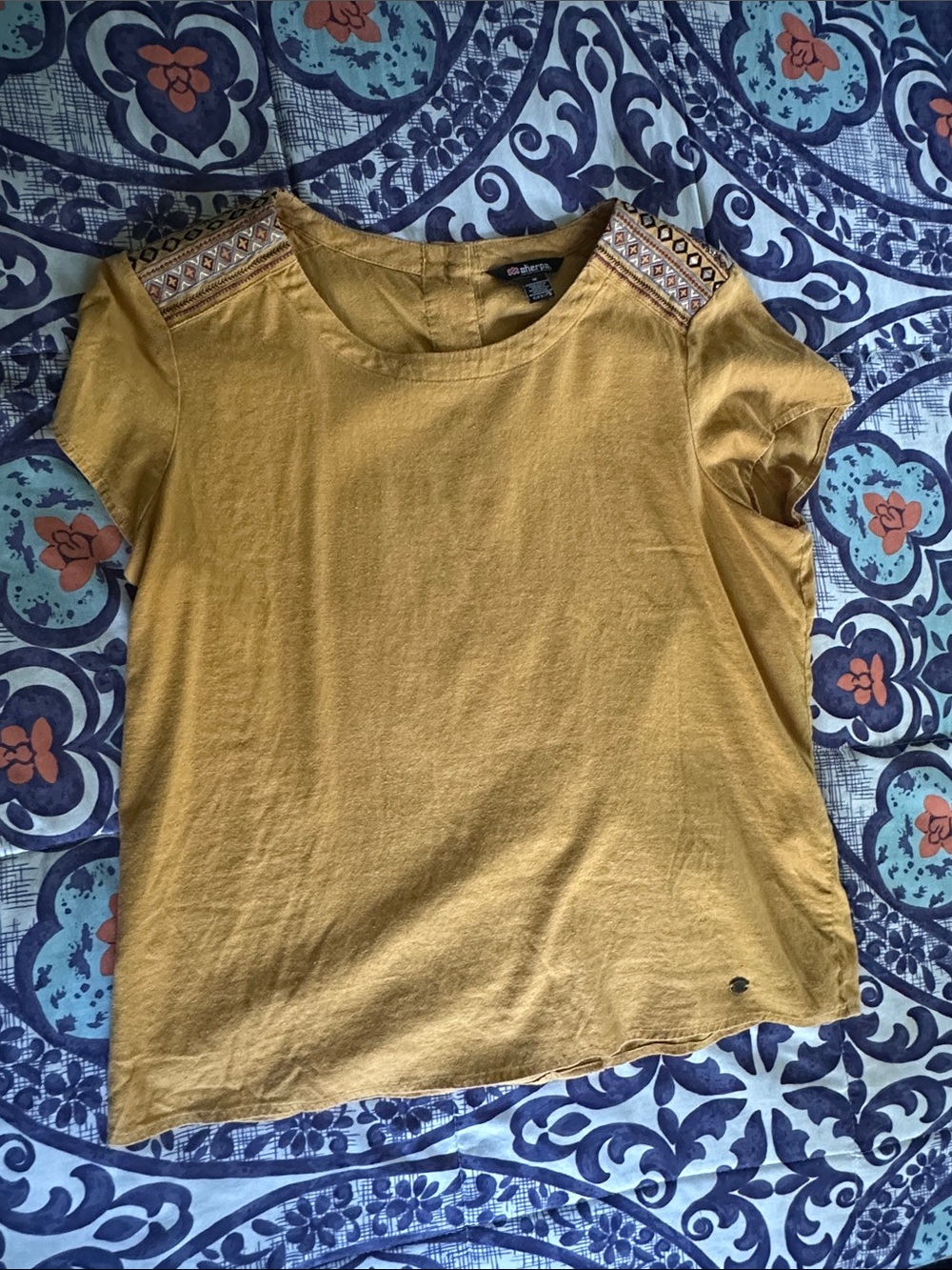 Sherpa Adventure Gear Embroidered Shoulder Mustard Short Sleeve Tee